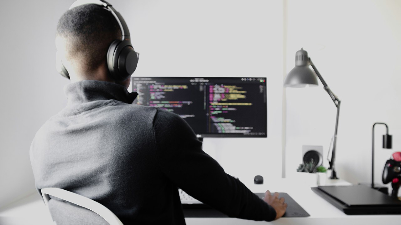 How to Secure a High-Paying Job in Canada Without a Degree—Success Stories Revealed: A software engineer working remotely